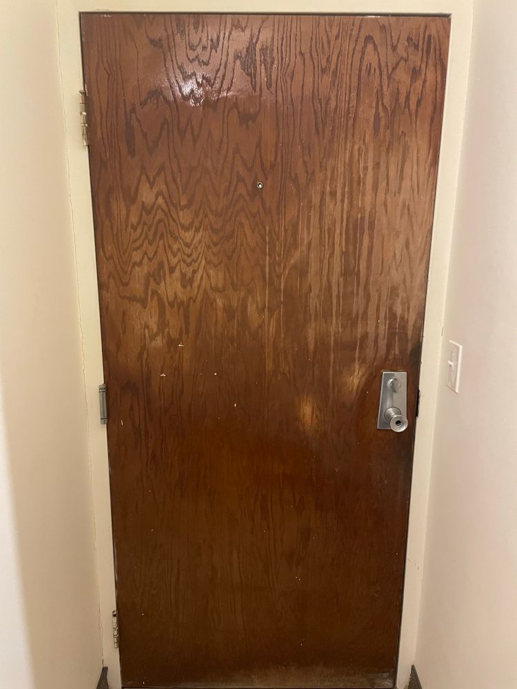 The “murder door” which is scratched and chipped wood. was it hollow? of course it was.