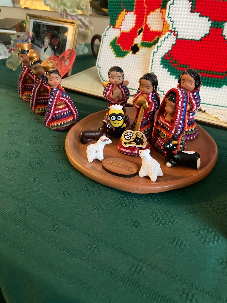 A nativity scene with goofy Minion figures added to the manger.