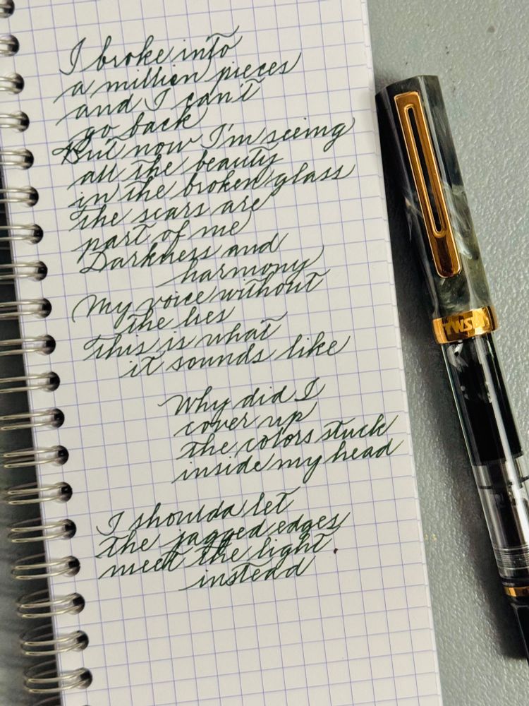 Handwritten lyrics to “What It Sounds Like” from the K-Pop Demoj Hunters OST beside a TWSBI Eco fountain pen 