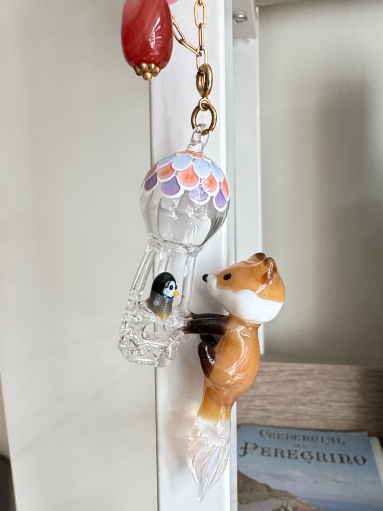 Glass fox pen pendant with penguin and balloon, by Glassophy