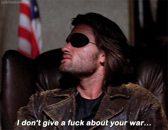 A clip from the movie Escape from New York (1981) dir. John Carpenter, where Snake Plissken declares, "I don't give a fuck about your war... Or your president." 
