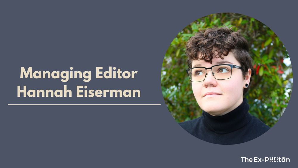 The background of the image is navy blue, and its text reads "Managing Editor Hannah Eiserman", along with The Ex-Puritan's logo. In a circle on the right is a photo of Hannah, who has curly hair and is wearing glasses, looking away from the camera.