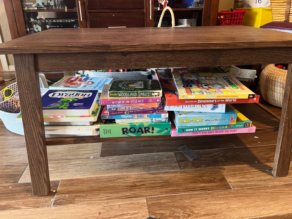 The living room books!

A coffee table with the bottom shelf filled with books that are easy to grab and read. 