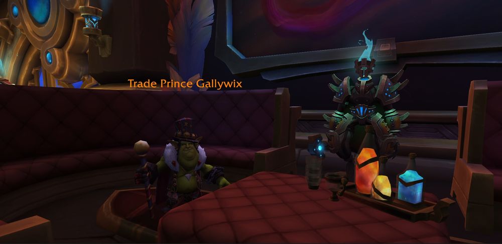A screenshot of Gallywix as seen in Tazavesh. He's standing in front of a plush couch, a broker to his right.