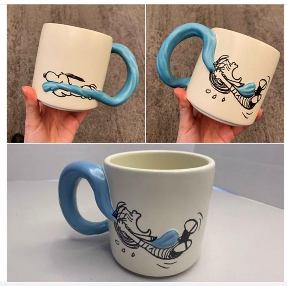 mug with the handle formed by Snoopy running off with Linus' blanket.
