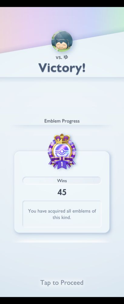 Screenshot of acquiring an event emblem for 45 victories in pokemon trading card game pocket