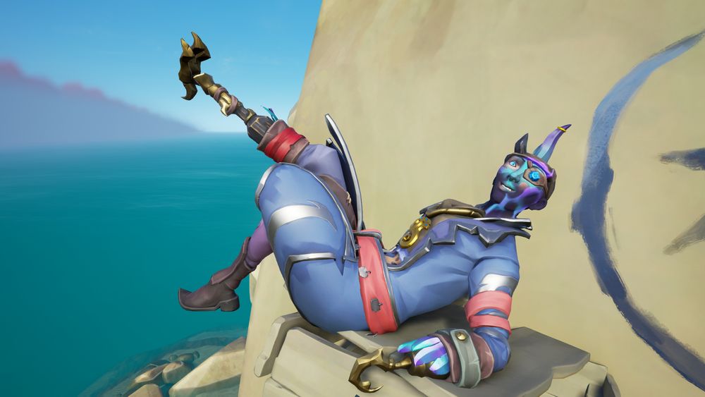 Sea of Thieves pirate wearing an assortment of bright blue clothes, face paint, hair, with some red, silver, and gold accents