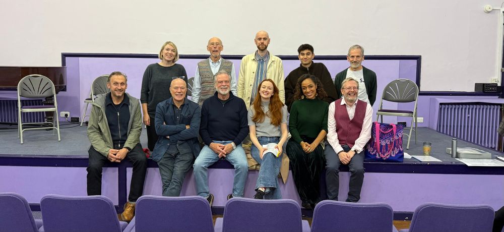 A company of actors take the stage