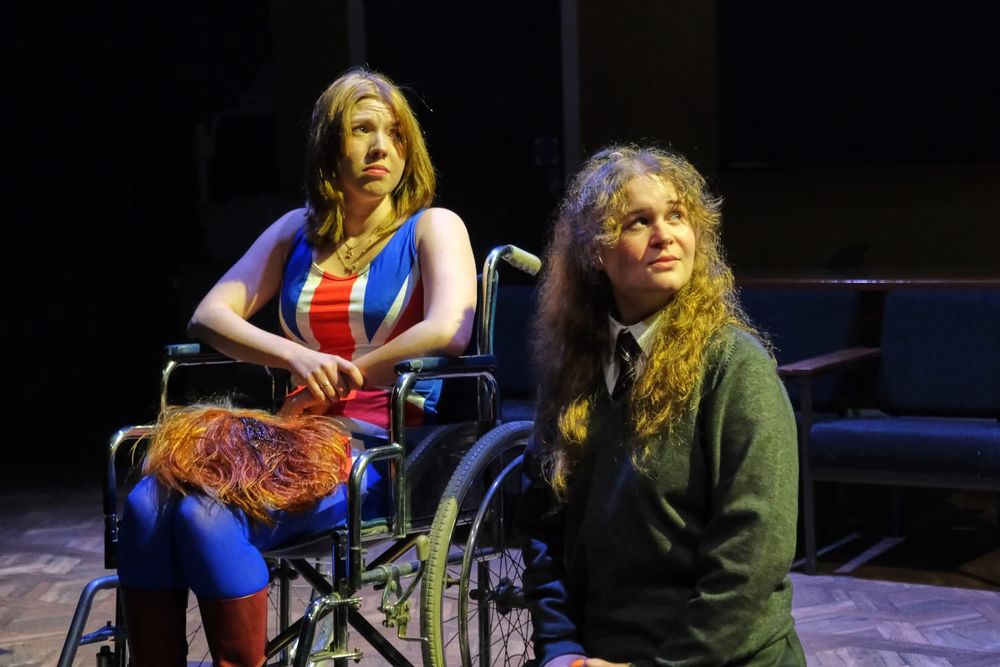Sue in a Geri Halliwell Union Flag dress with Emily a student
