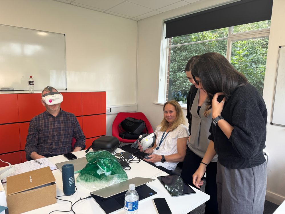 Decision Lab staff demoing VR headsets for the virtual reality training project for Nottingham Trent University's Psychology department.