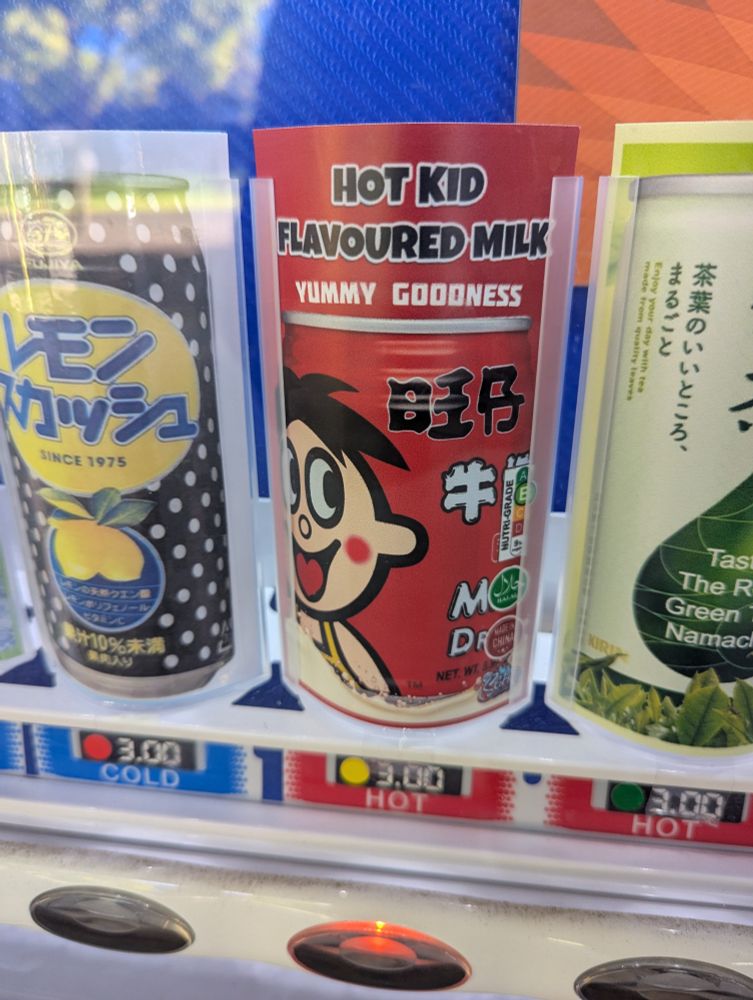 A can with the words 'hot kid flavoured milk' on it