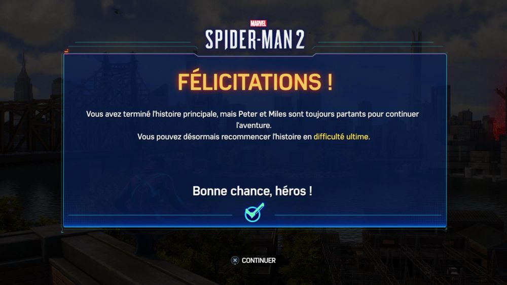 Capture d’écran de fin de jeu de Spider-Man 2 sur PS5 : un message de félicitations est affiché et indique la fin de l’aventure principale