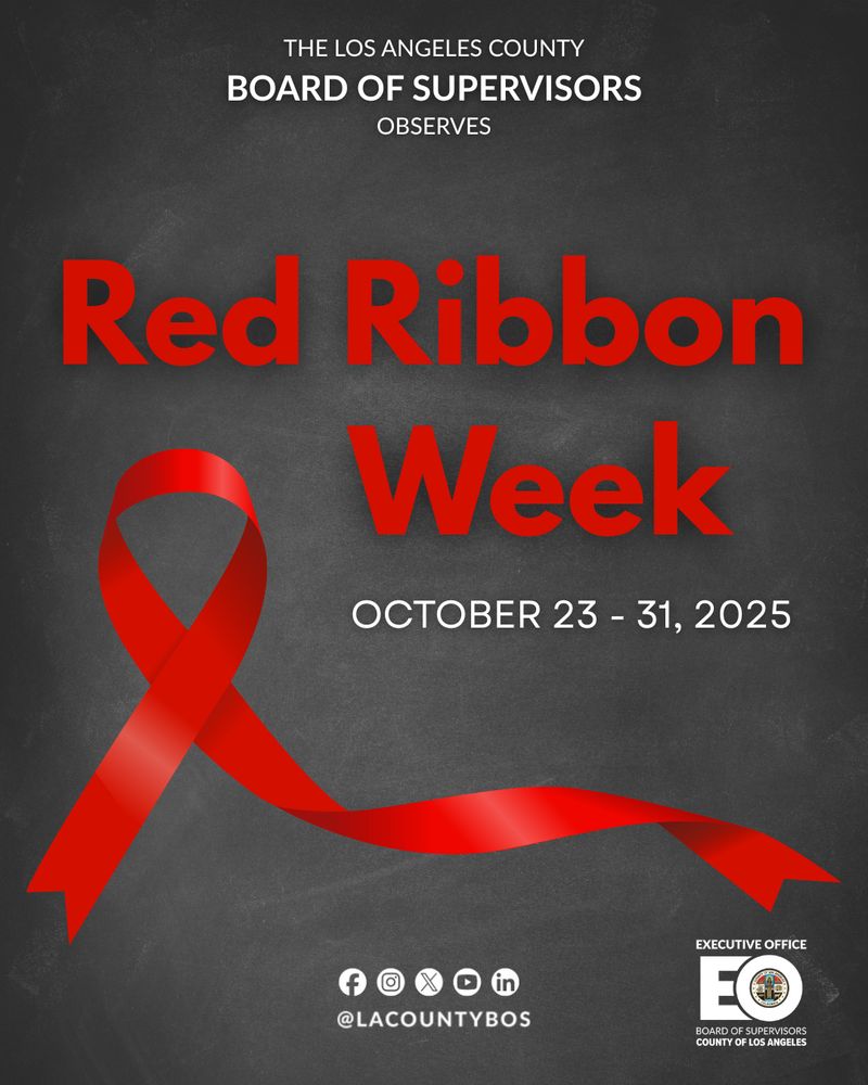 The text reads: "THE LOS ANGELES COUNTY BOARD OF SUPERVISORS OBSERVES Red Ribbon Week OCTOBER 23 - 31, 2025". A large, flowing red ribbon is prominently displayed across the lower-left to the center-right of the image, forming a loop on the left side. At the bottom right is the logo for the "EXECUTIVE OFFICE BOARD OF SUPERVISORS COUNTY OF LOS ANGELES". Social media handles are listed at the bottom center: "@LACOUNTYBOS" with icons for Facebook, Instagram, X (formerly Twitter), YouTube, and LinkedIn.