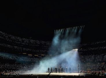BTS looking out at the crowd during Permission To Dance Onstage LA