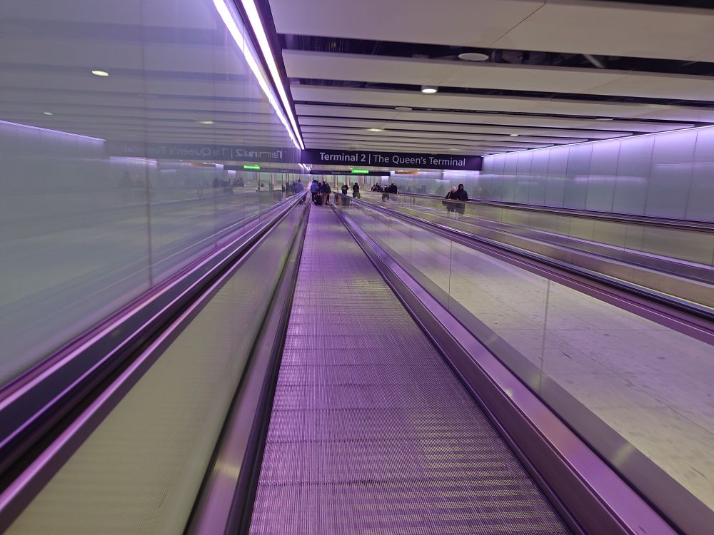 A photo of the travelator hallway leading to Heathrow Terminal 2