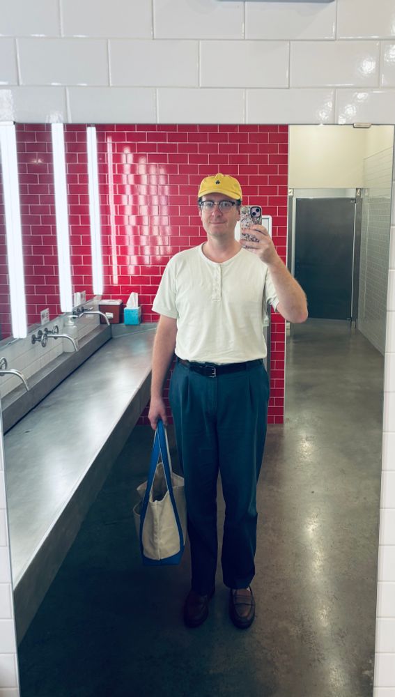 Middle aged man’s bathroom selfie:
Yellow cotton ball hat
Banana Republic henley, off white
Madewell pleated cotton/linen pants, blue
PRL penny loafers, brown
LL Bean tote