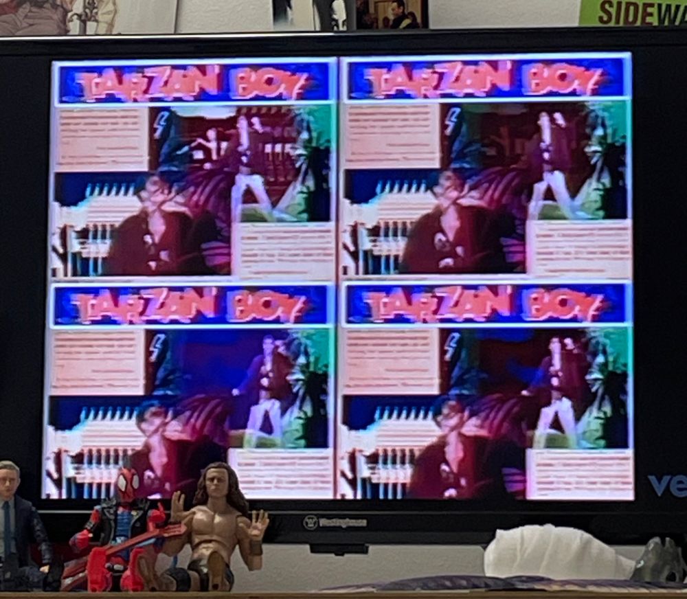 A picture of my tv playing the Tarzan Boy music video 