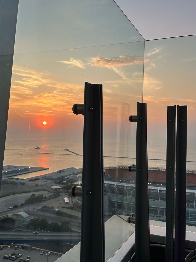 Sunset from Bar 32, featuring the Factory of Sadness.