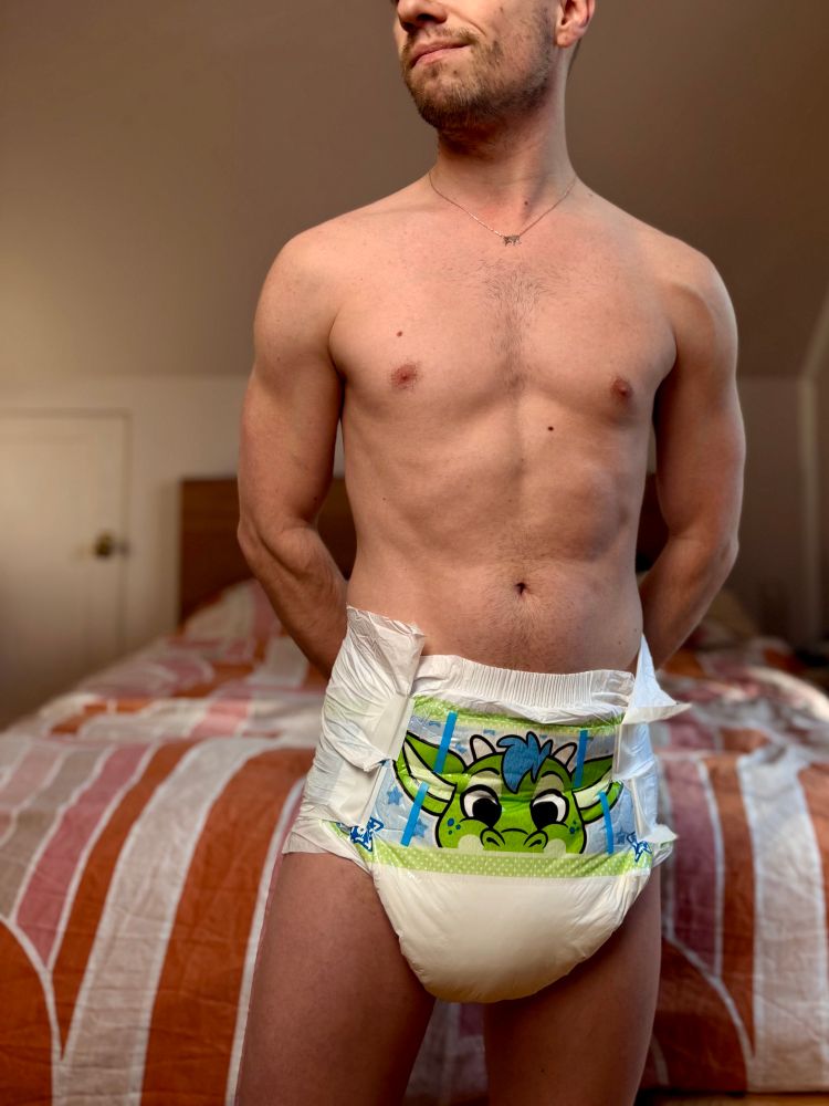 RiverWearsDiapers wearing a dragon Peakabu