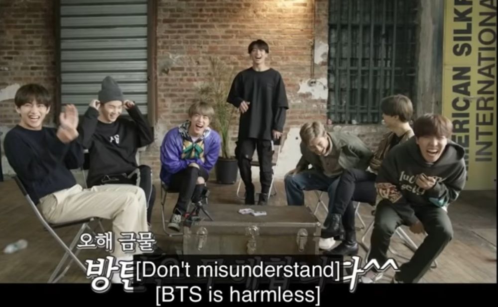 screeshot of run bts episode where the guys are sitting around laughing and the captio reads "Dont misunderstand. BTS is harmless"
