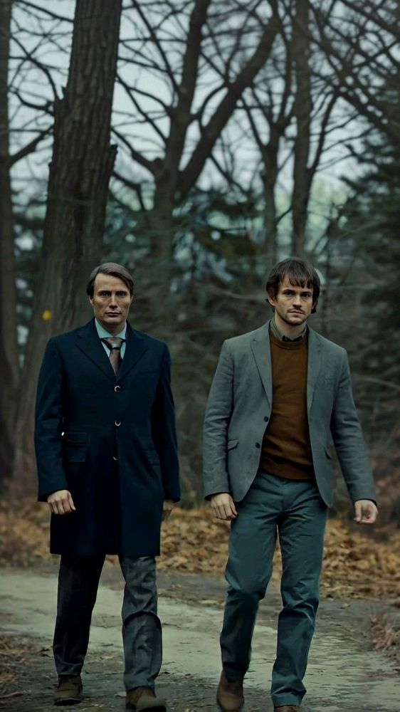 Hannibal and Will walk down a dirt road