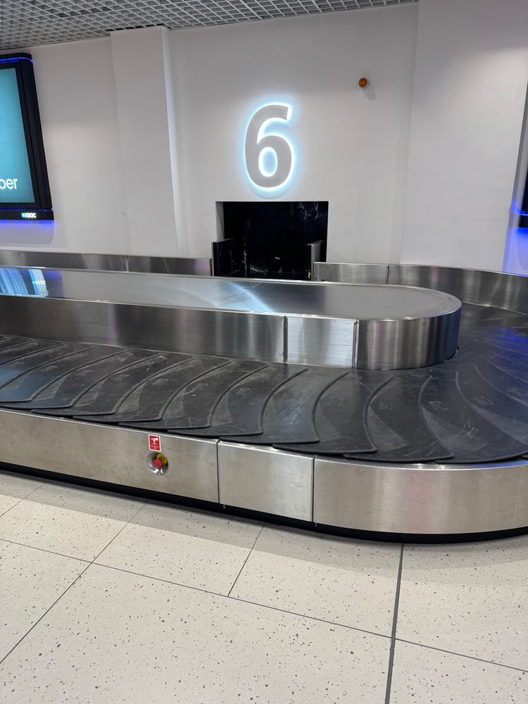 Baggage belt at Malta airport rudely devoid of baggage. 