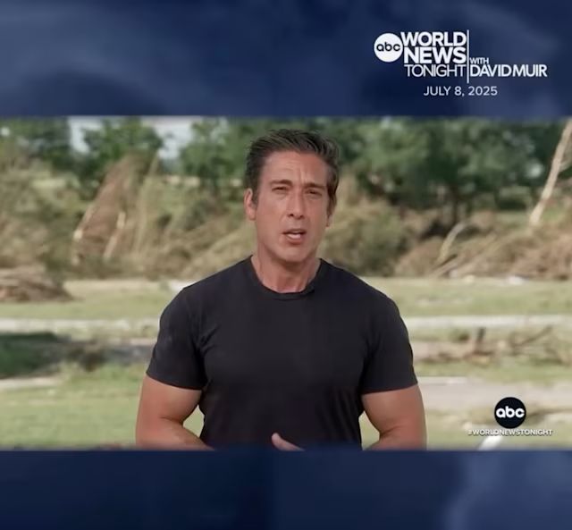 David Muir in a black t-shirt with guns blazing.