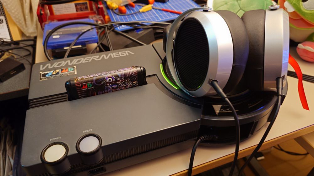 A Wondermega (a kind of 16Bit Sega) with Devils Crash MD and some good headphones