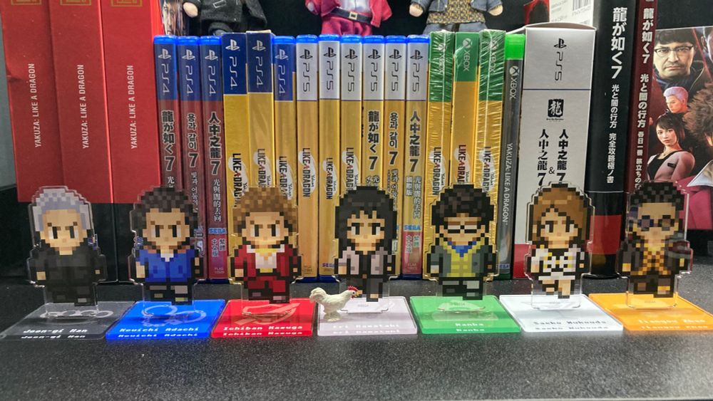 standees of the pixel versions of ichiban kasuga and all his friends from yakuza: like a dragon