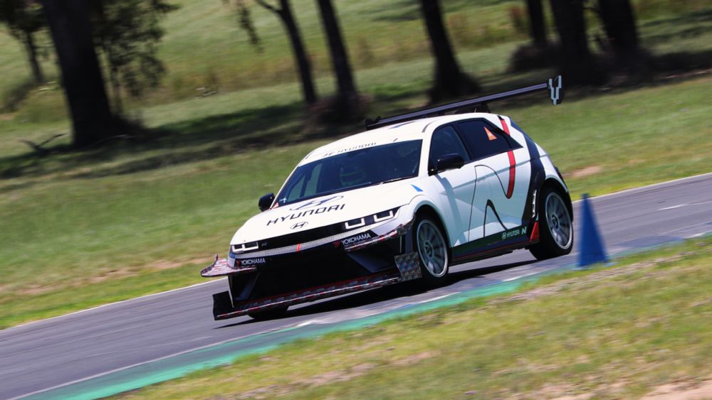 A Hyundai IONIQ 5 with an extreme time attack aero kit.