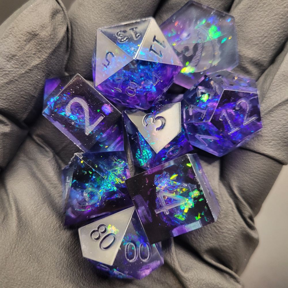 Space style eight piece dice set for use in tabletop role playing games 