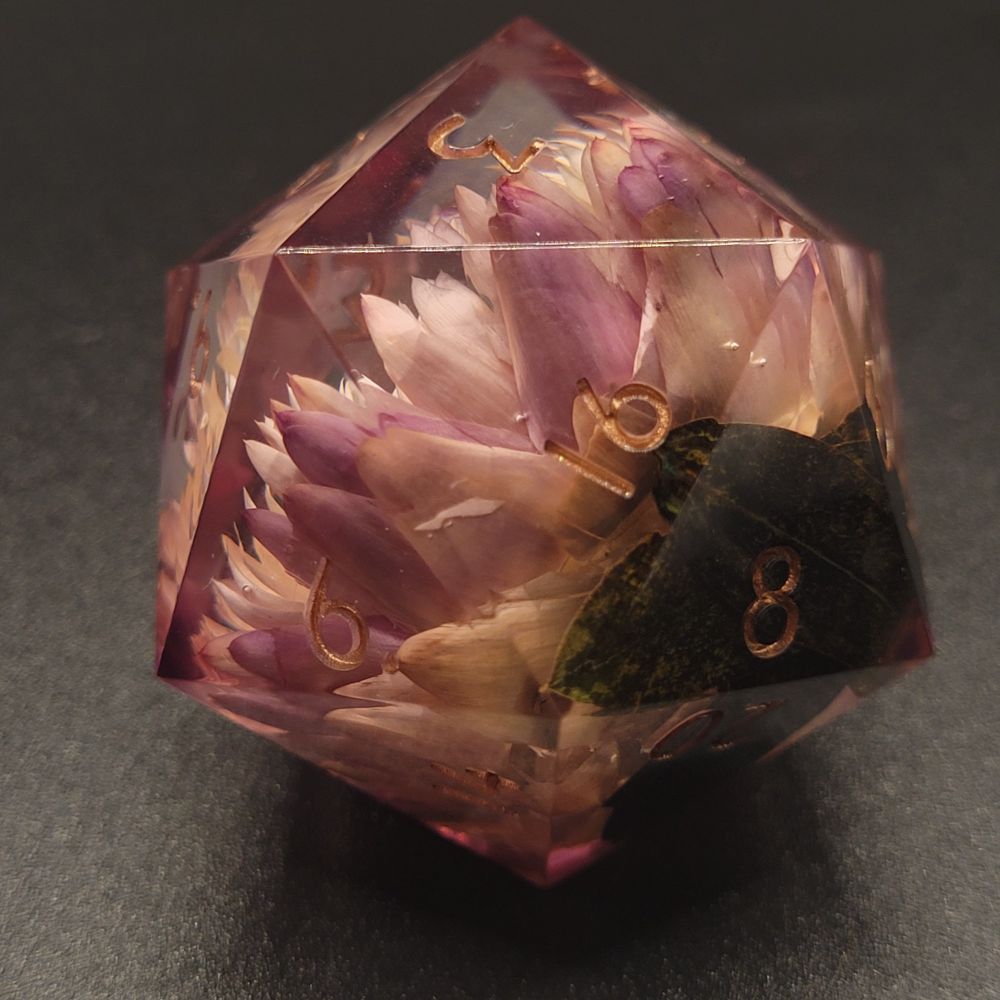 Another angle of the large handmade dice with a flower inside of it