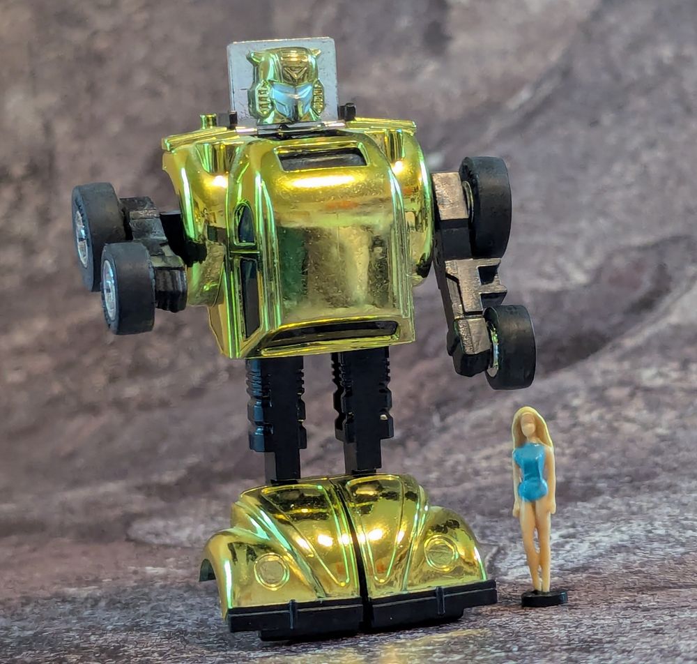 Vintage Transformers Generation 2 Bumblebee next to World's Smallest Micro Malibu Barbie 