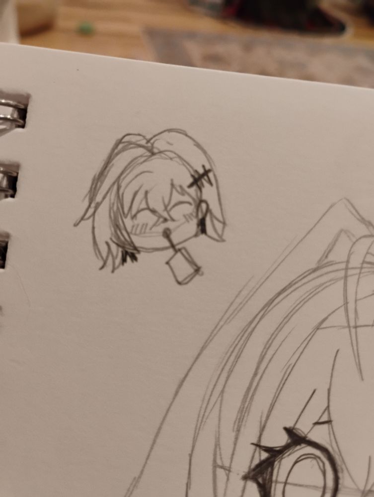 Belle drinking a juice box.