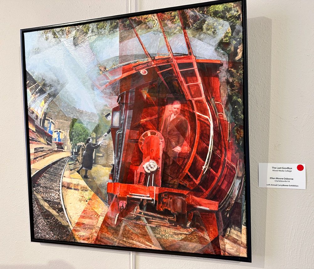 Picture of a painting of a red train on a gallery wall. The label has a red dot on it, indicating it has sold.