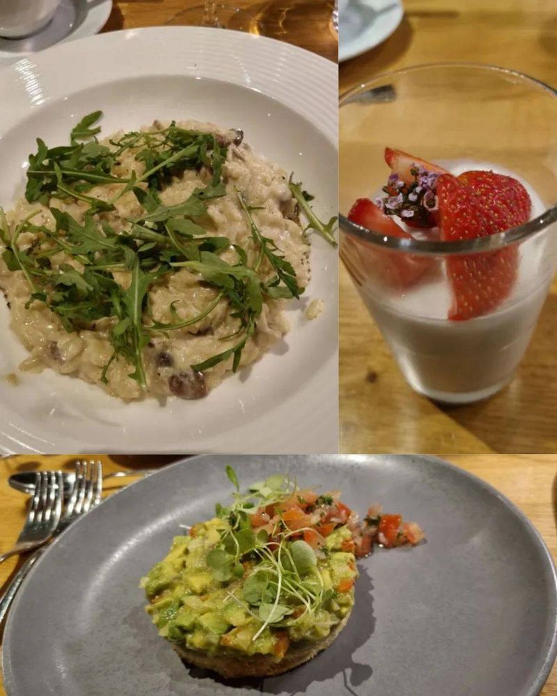 Photos of the delicious food at the Reading Visual Devices conference: an avocado starter, risotto, and a coconut pannacotta.