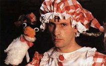 Rimmer & a puppet penguin.