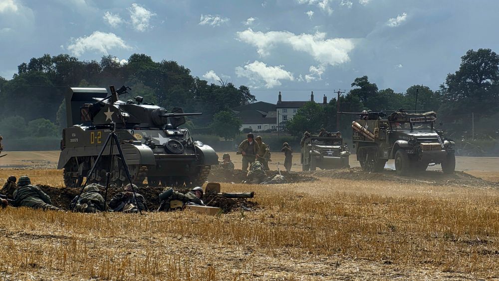 Tanks & trucks in battle.