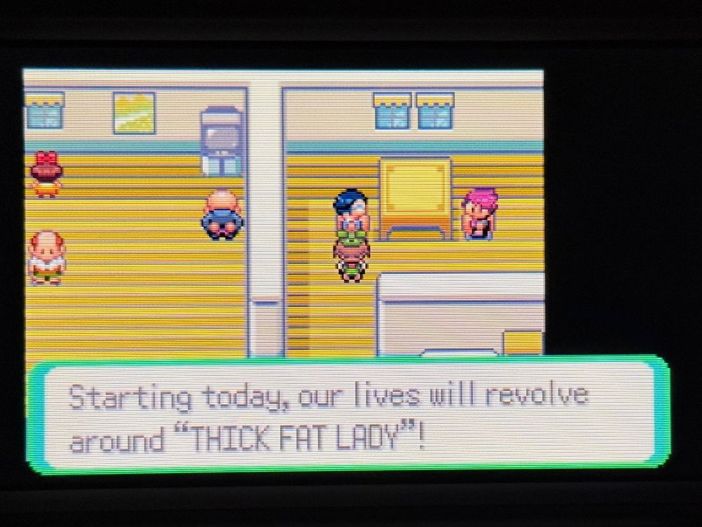 Screenshot of Pokémon emerald.  A character says “Starting today, our lives will revolve around THICK FAT LADY"