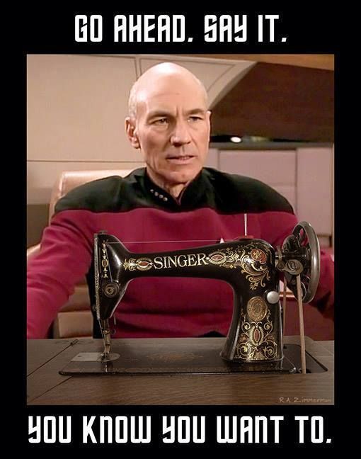 Jean Luc Picard sitting at his desk looking at a Singer sewing machine. Caption says 'Go ahead. Say it. You know you want to.'...