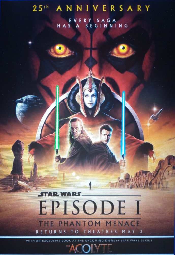 Photo of a poster of the Star Wars: Phantom Menace, including advertising for a preview of Star Wars: Acolyte.