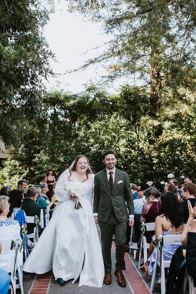 My now-wife and I walk down the aisle after our ceremony