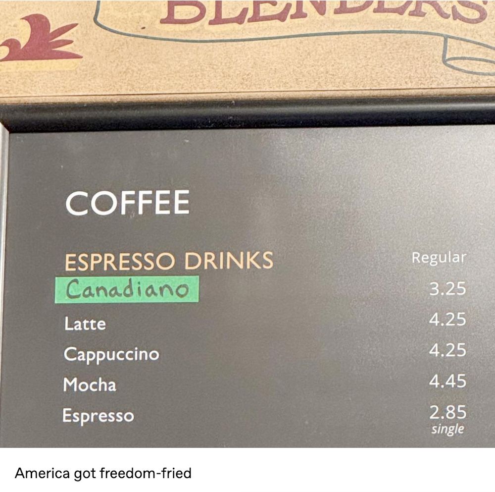 Photo of a menu at a coffee shop showing the Espresso Drinks section. Americano has been covered with a piece of green tape on which Canadiano has been written. The photo is captioned "America got freedom-fried"