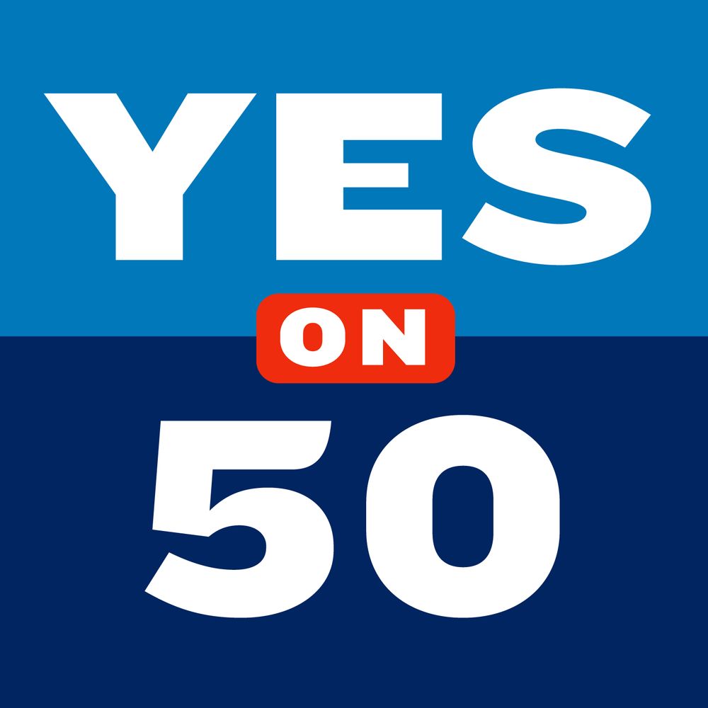 A blue sign that says "YES ON 50"