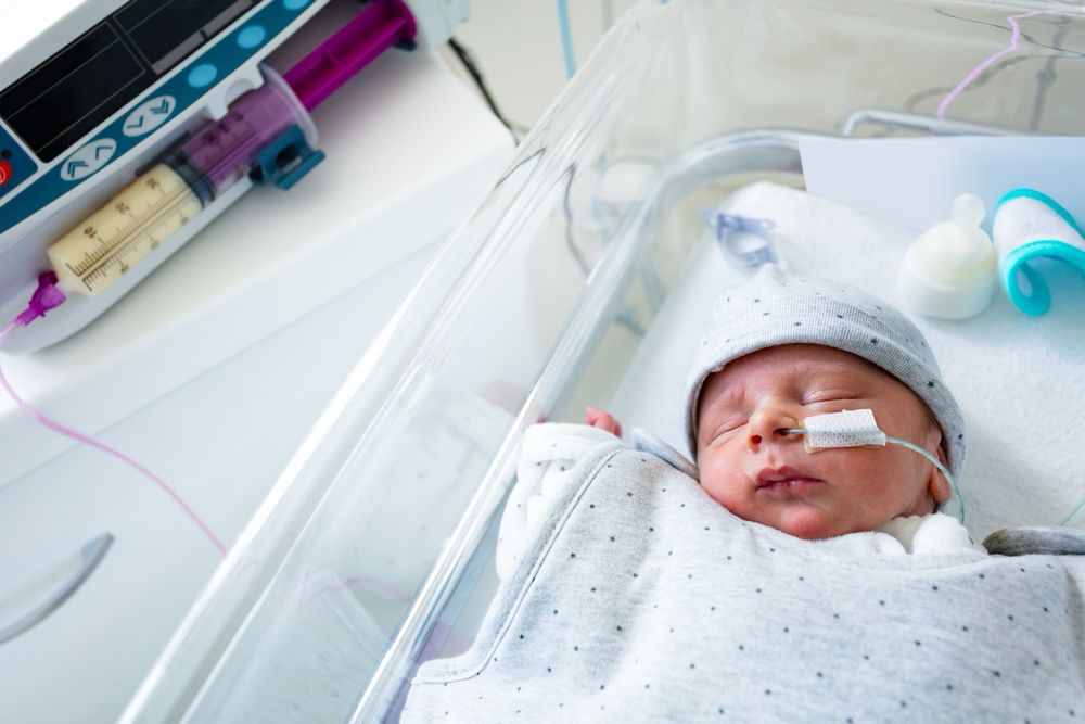 Baby in a cot