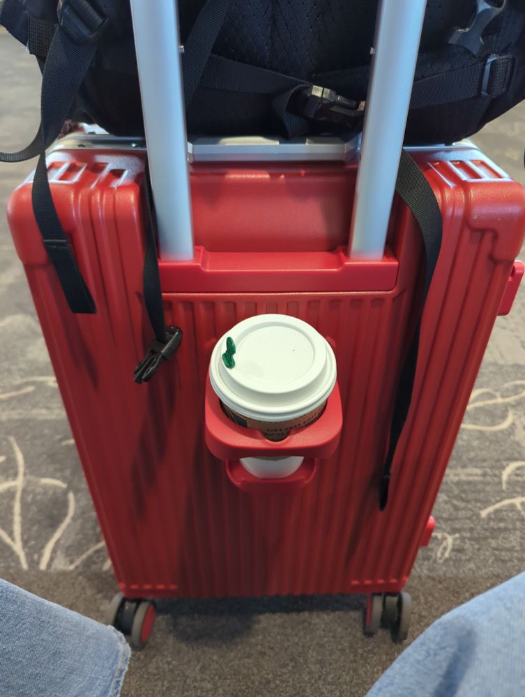 Suitcase with cup holder 