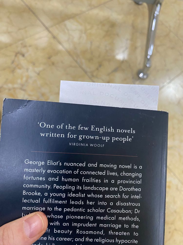 The back of a copy of Middlemarch, with a blurb from Virginia Woolf: “one of the few English novels written for grown-up people.”