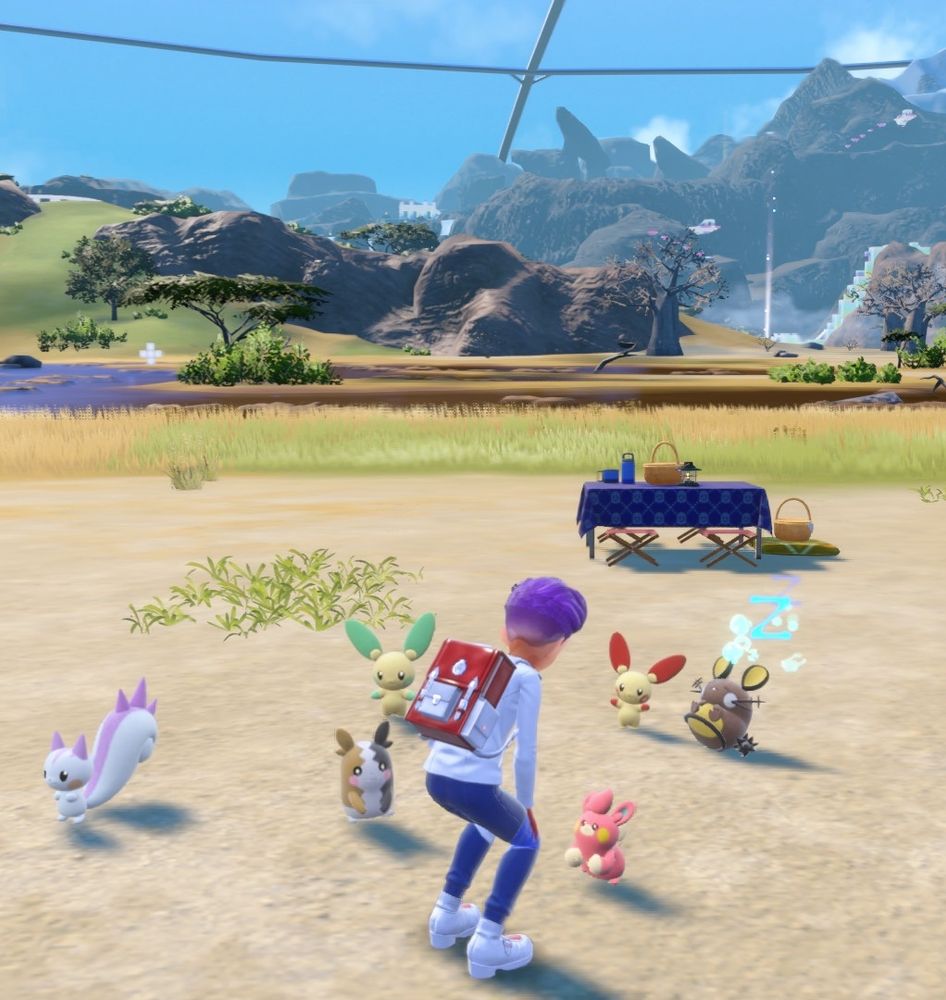 A screenshot from Pokémon Violet, showing the character interacting with various small Pokémon 