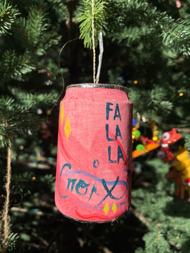 Christmas tree ornament that is improbably shaped like a can of La Croix seltzer. 