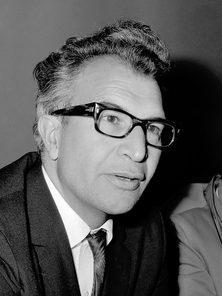 A black & white photo of Dave Brubeck.